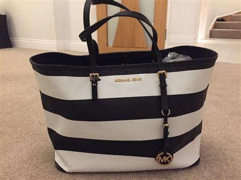 black and white striped michael kors bag|Michael Kors crossbody bag black.